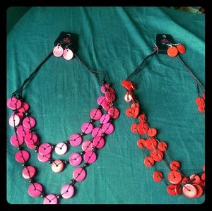 Two Necklaces with matching Earrings